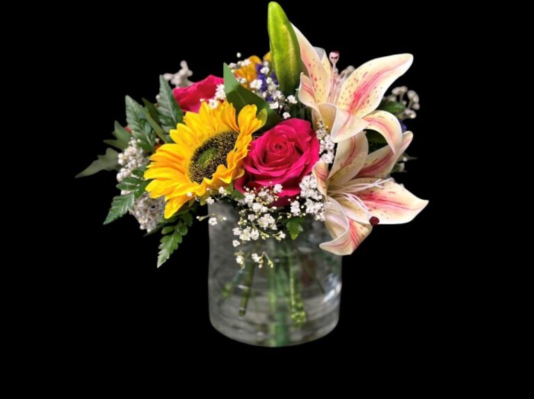 Affordable local flowers delivered from Jefferson, Iowa to Churdan, IA and surrounding areas. Summer Love Inspired with sunflowers, lilies, and roses.
