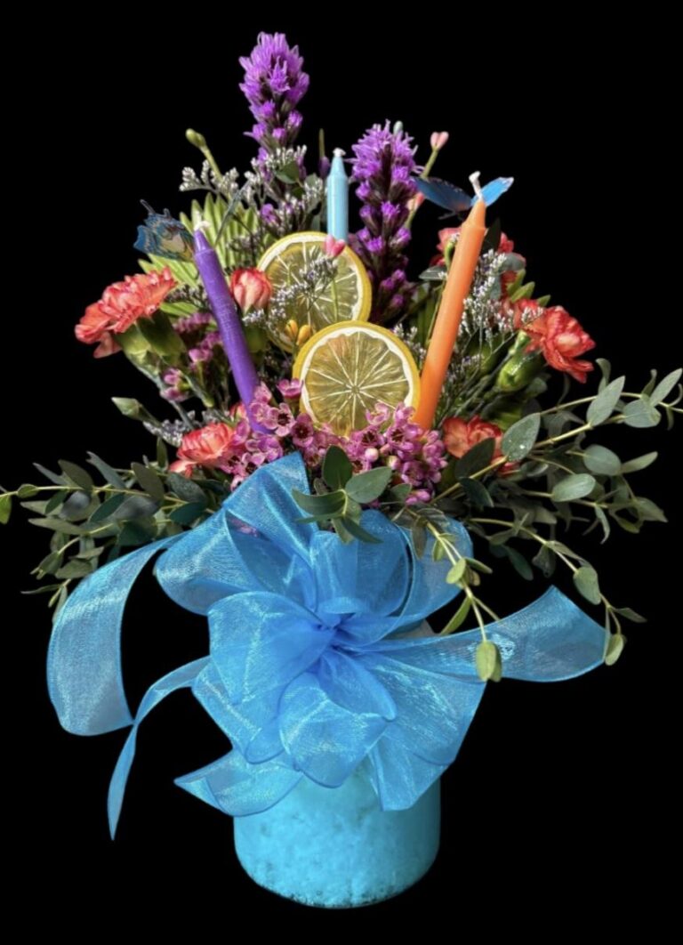 Affordable celebration flowers under $65 with decorative accents for Jefferson, Scranton, Coon Rapids, IA