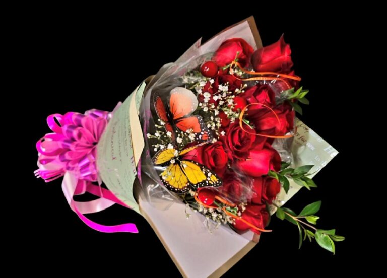 Affordable rose bouquet delivered by local Jefferson, IA florist. Inexpensive 10 hand-tied rose bouquet cost saver with no vase delivered from Jefferson throughout Green County, Iowa.
