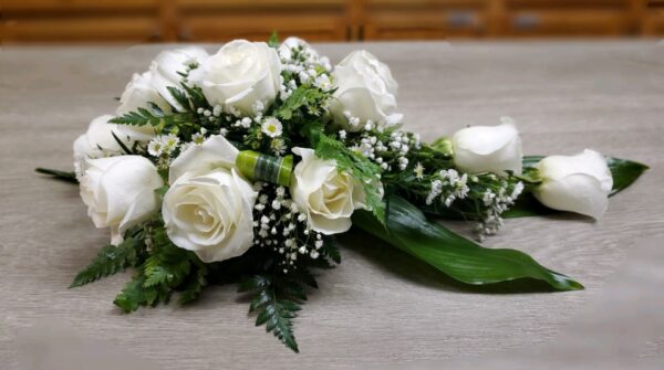 Simply Elegant Tear Drop Casket Arrangement